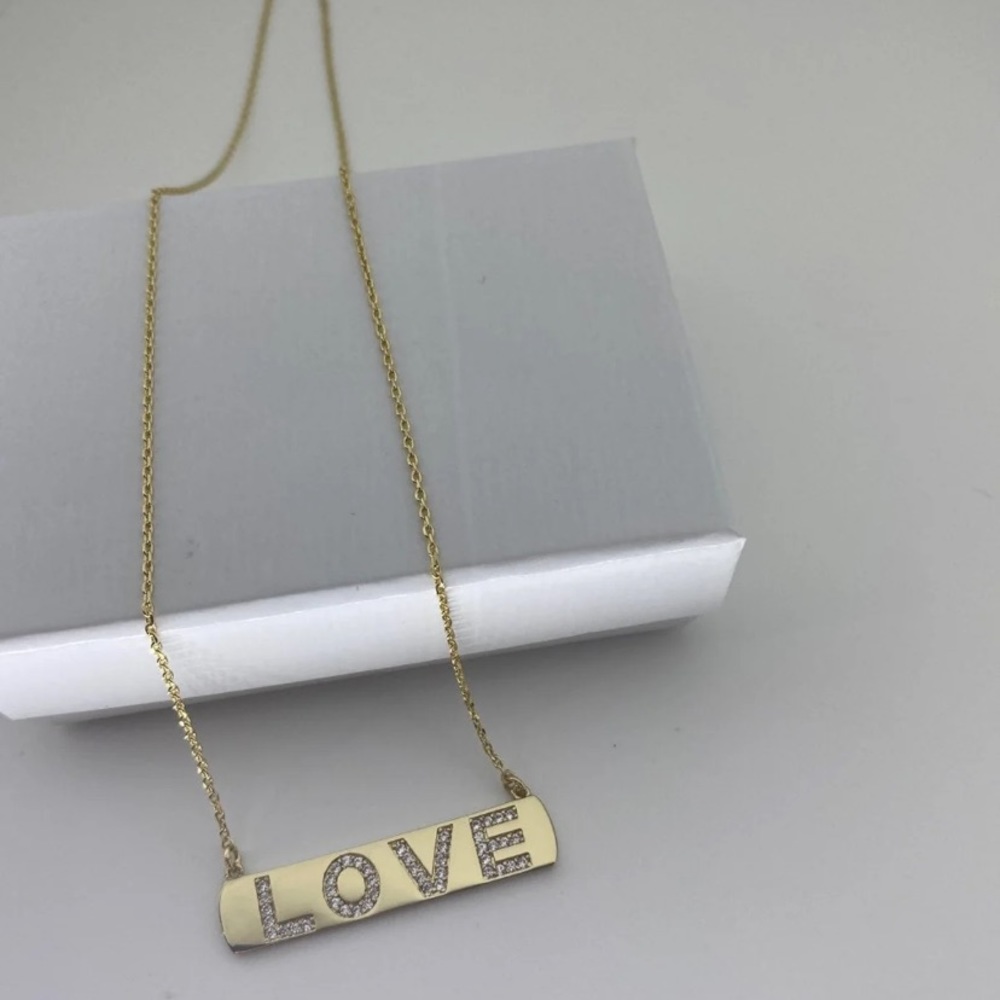 Brand New  Gorgeous “Love” bib necklace